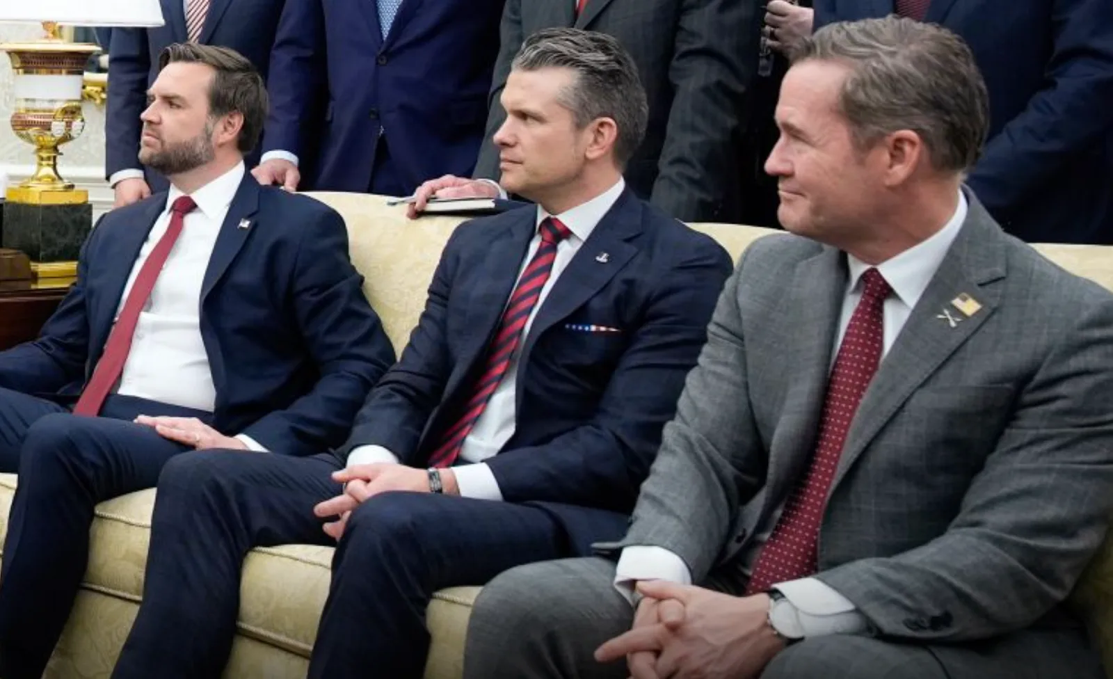 Three senior Trump Administration officials - VP Vance, SecDef Hesgeth, and advisor Mike Walz, all of who discussed confidential information in a signal chat unaware that a journalist had been accidentally added.